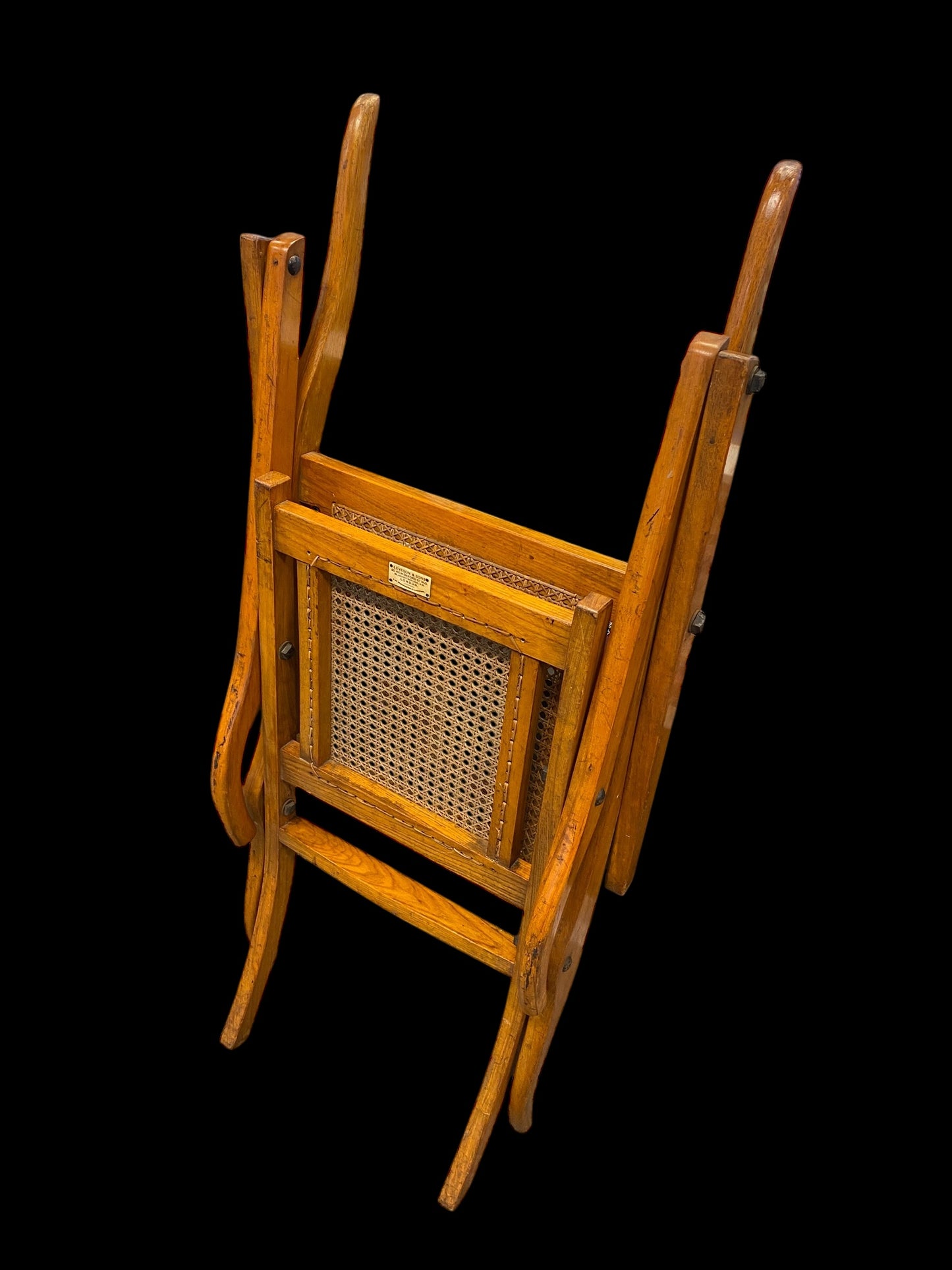 A first World War ash and cane campaign traveling or invalid’s folding armchair