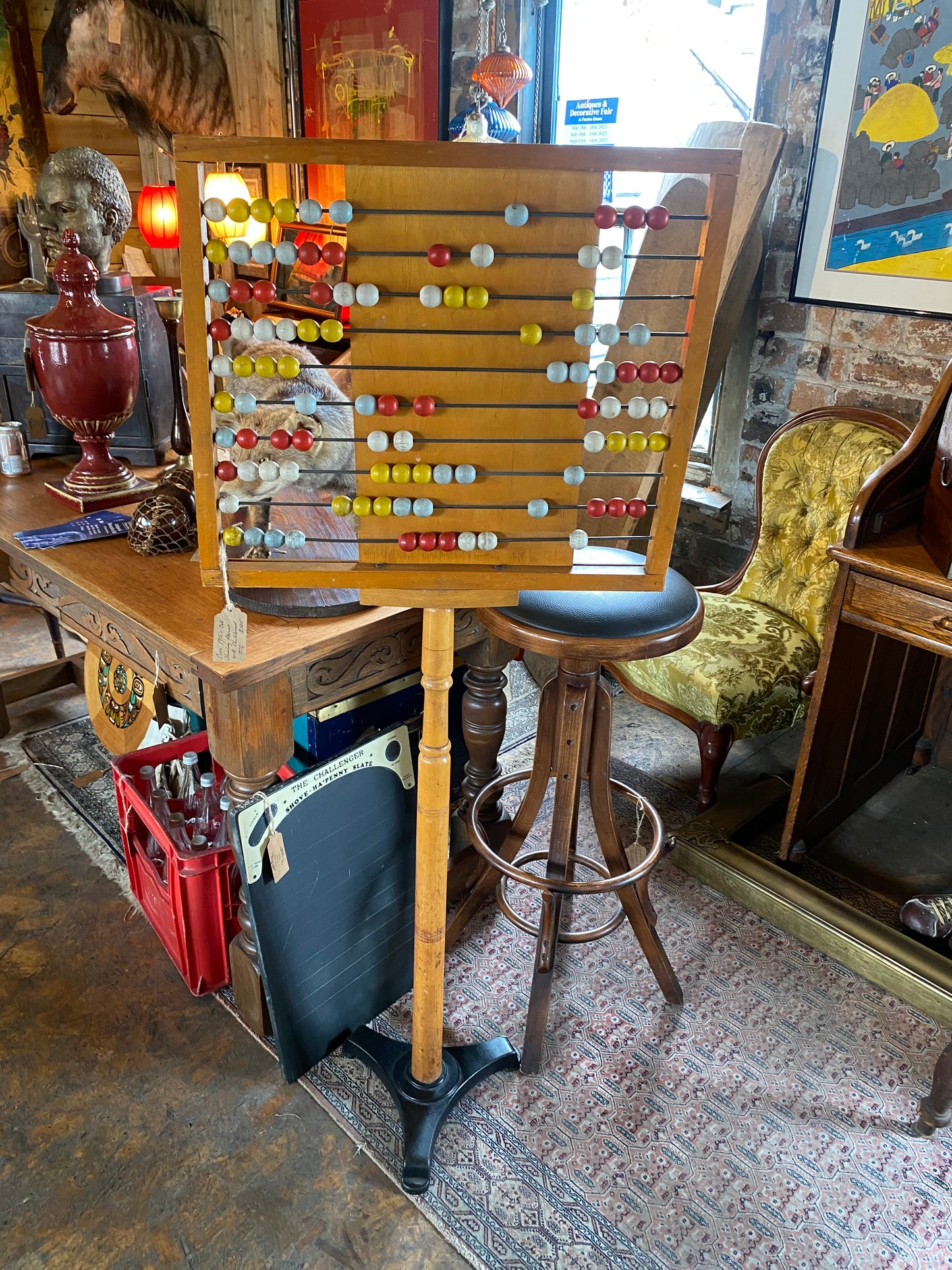 Mid-century freestanding pine abacus with chalk board on cast iron base