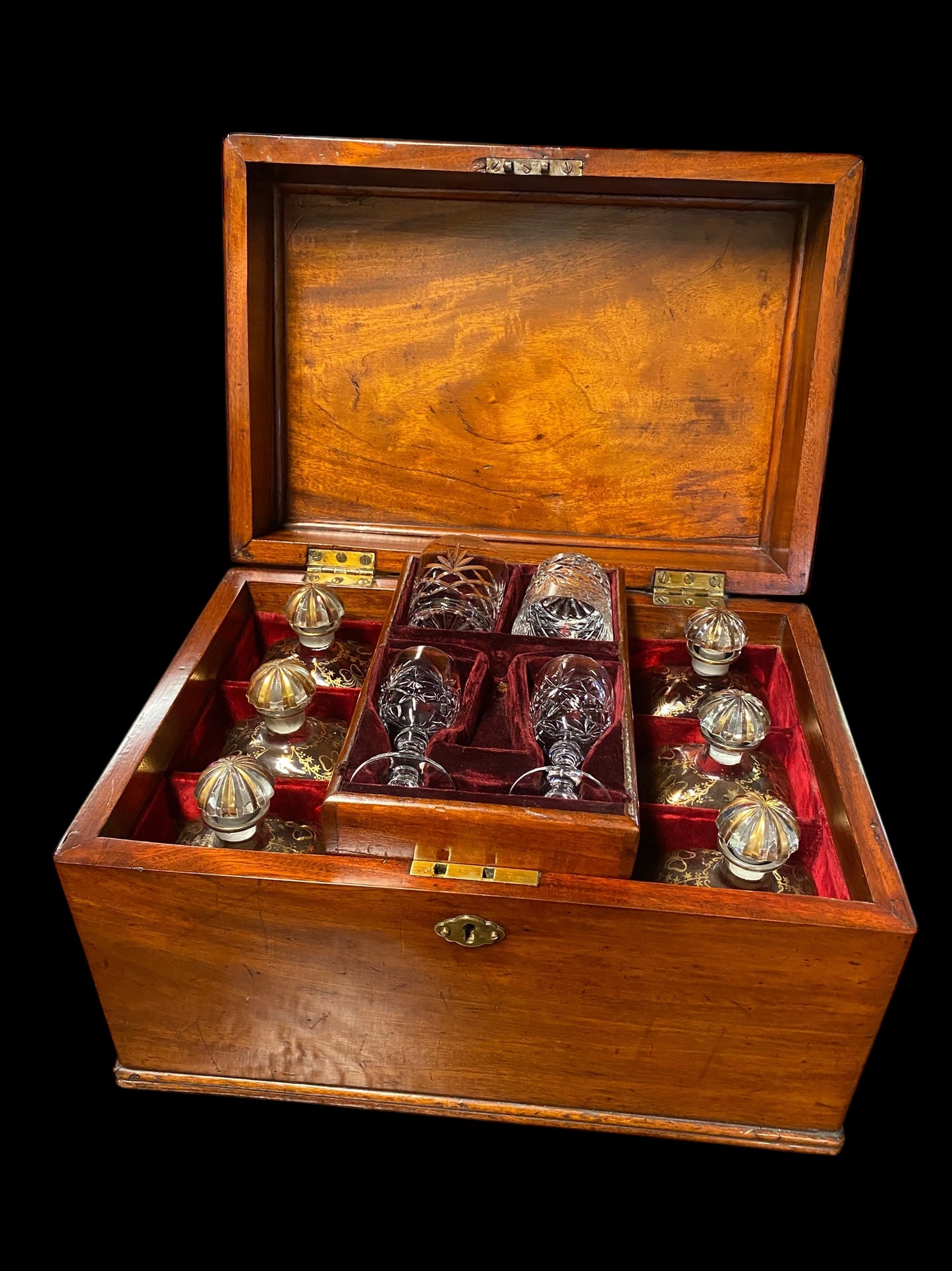 A stunning Victorian campaign decanter set in a mahogany chest