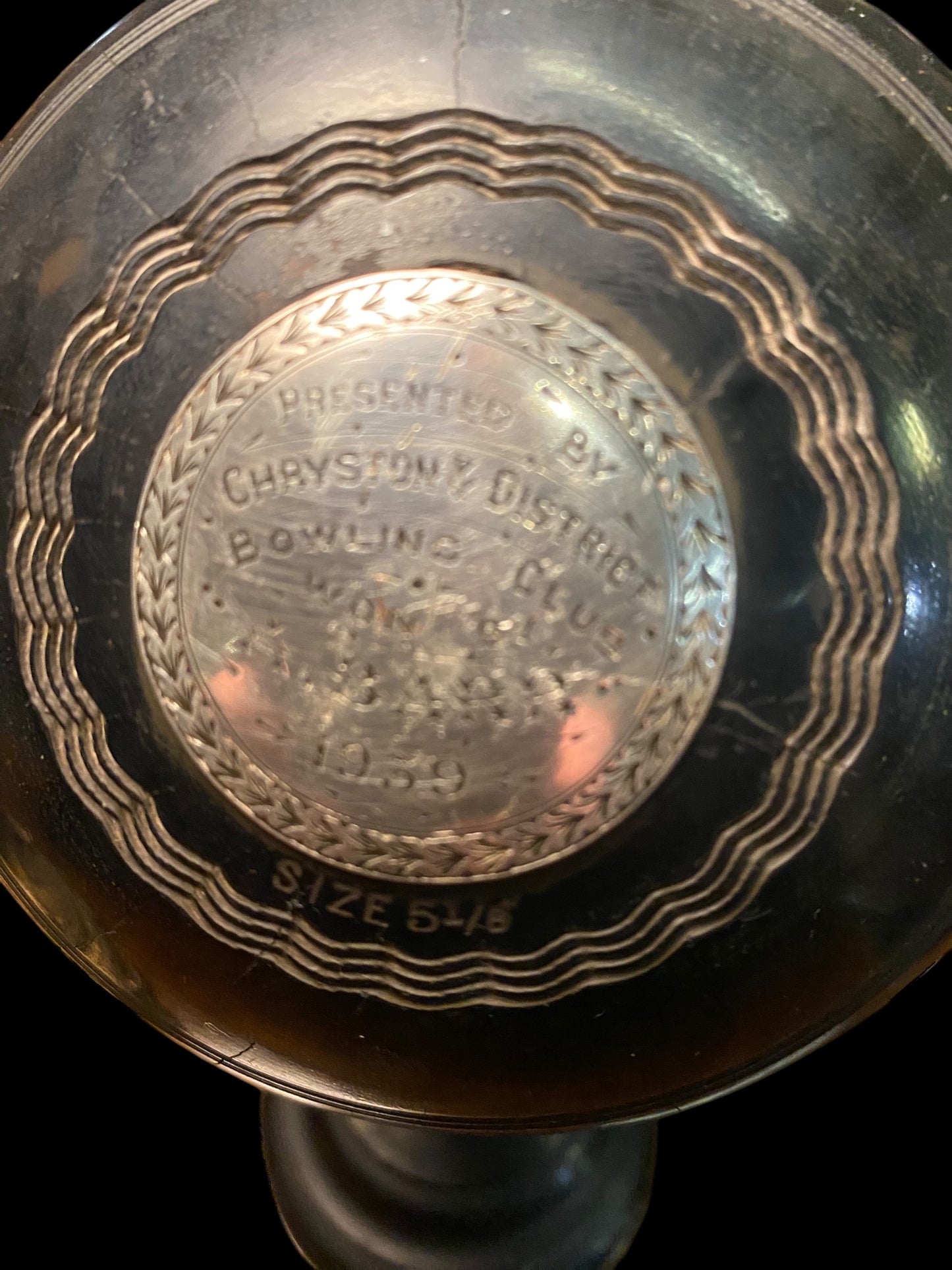 A pair of lawn bowls trophy’s on ebonised stands dated 1939
