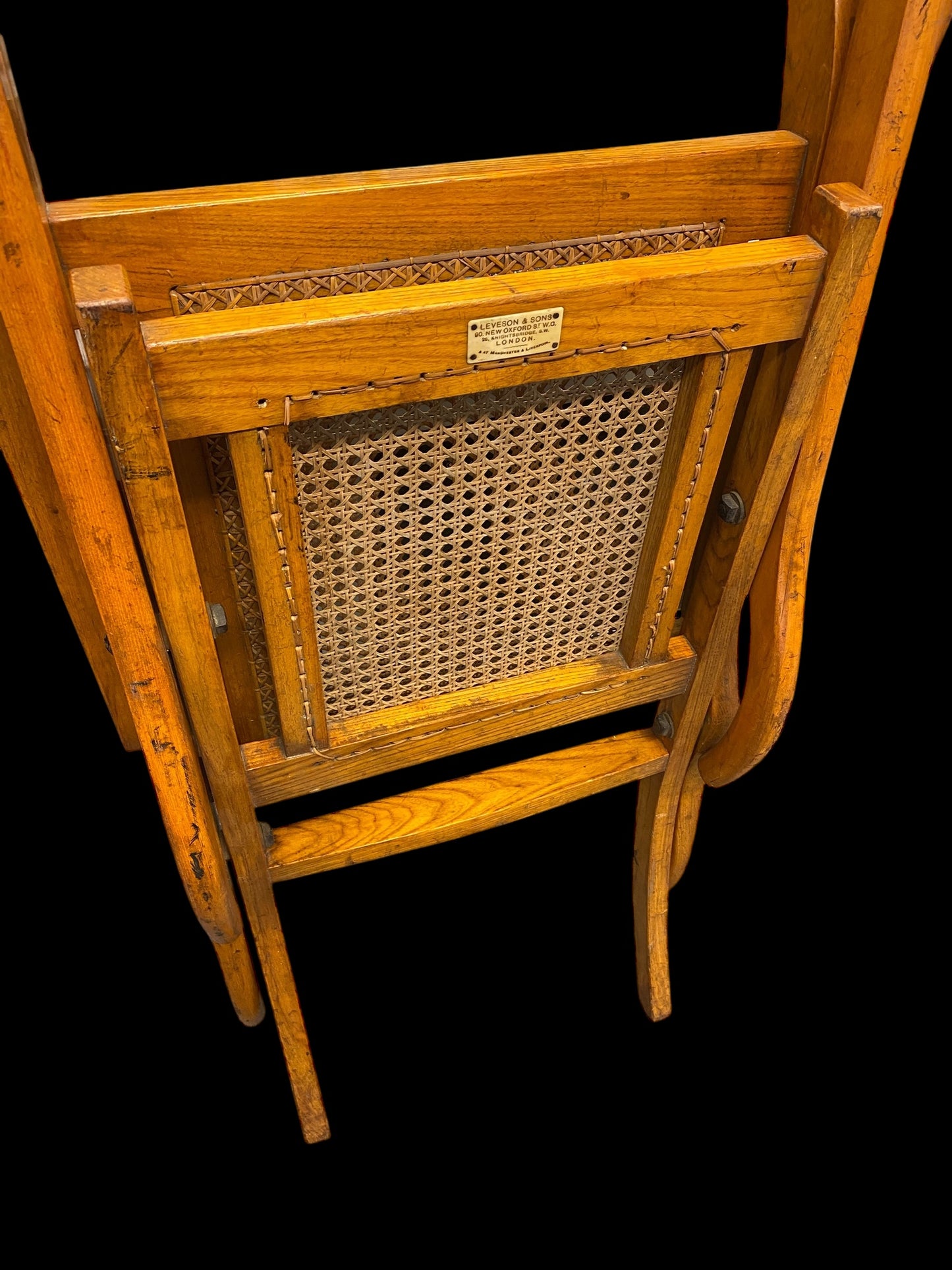 A first World War ash and cane campaign traveling or invalid’s folding armchair