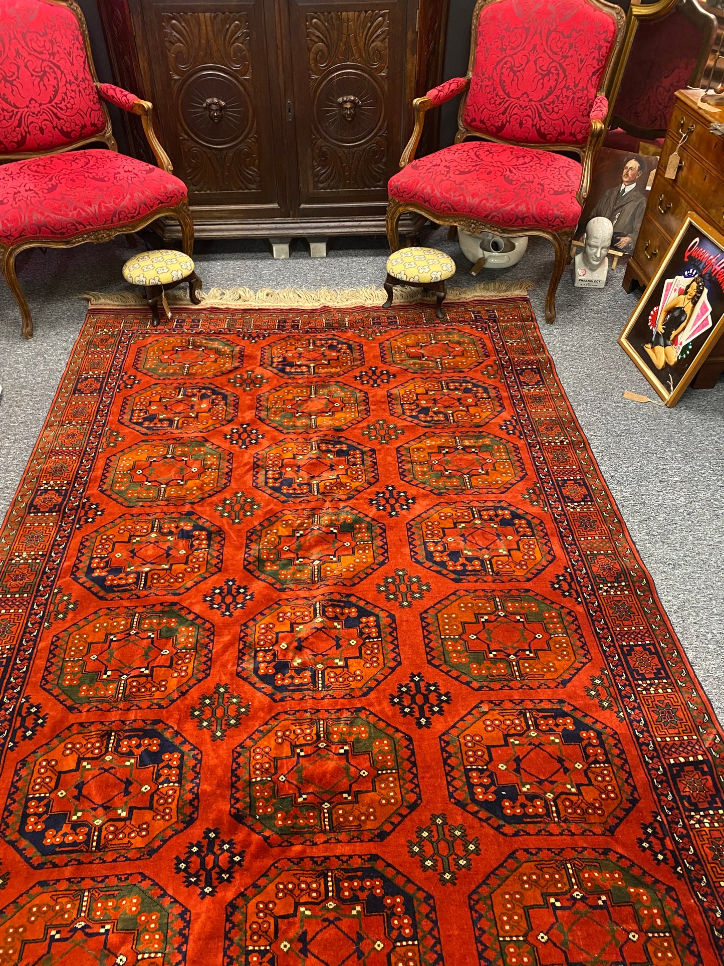 A stunning Turkoman Kerki rug with motif decoration on an orange ground, 275 x 165cm (including fringe)