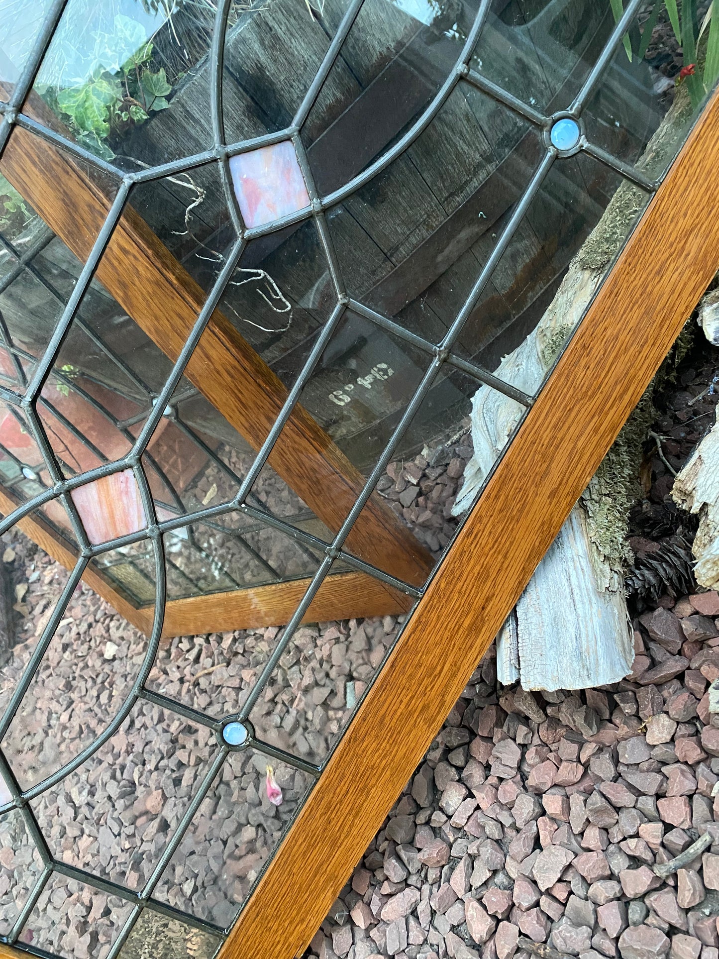 A pair of oak framed leaded stained glass panels circa 1900’s