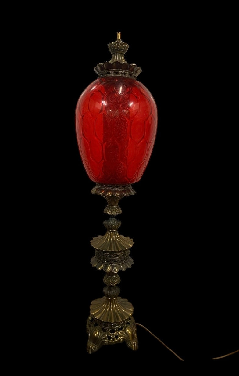 A large 1960’s Carl Falkenstein lamp with a cranberry glass shade