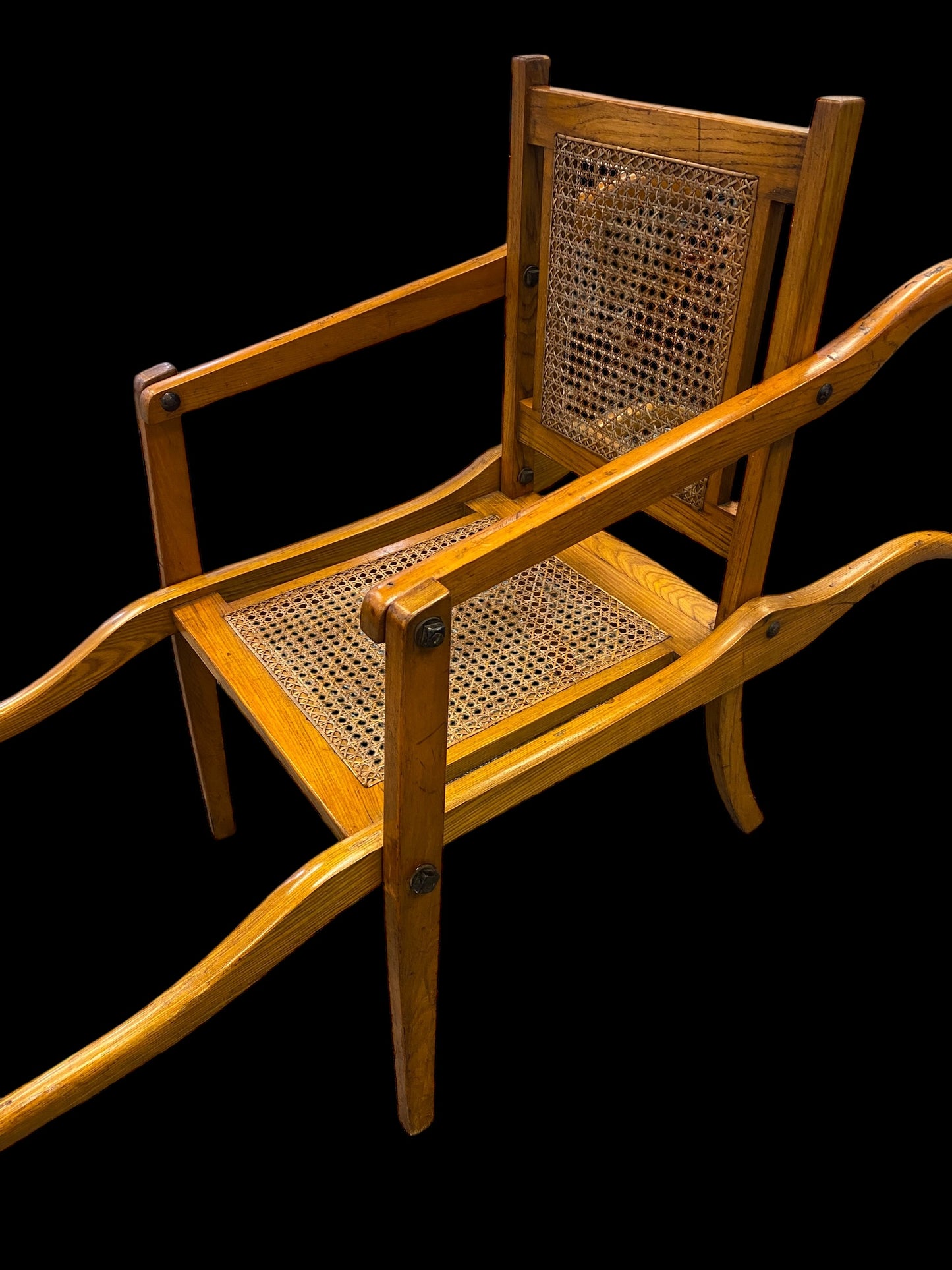 A first World War ash and cane campaign traveling or invalid’s folding armchair