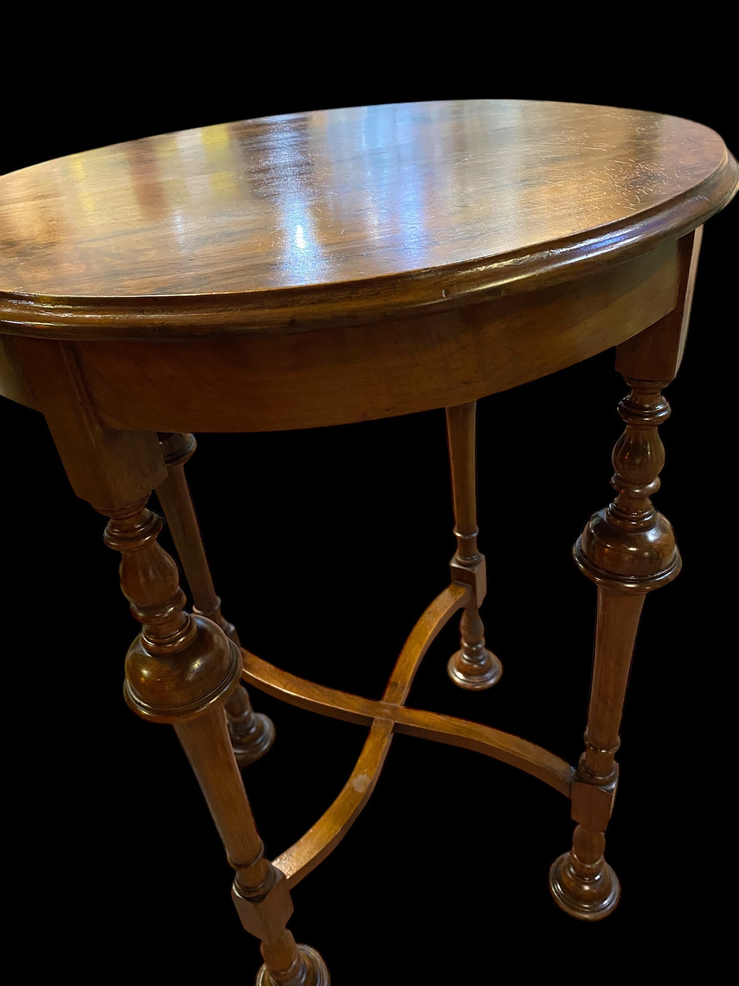 Edwardian circular walnut lamp table