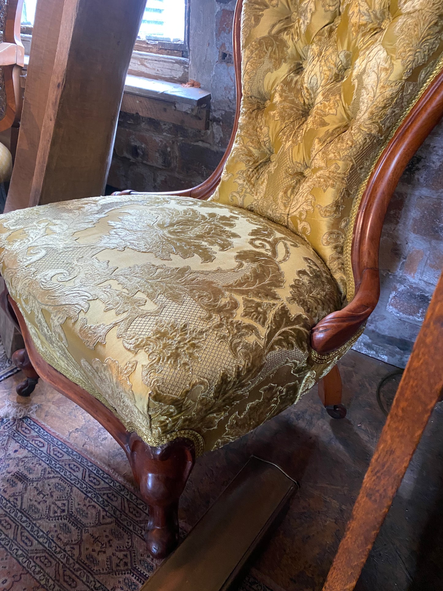 Victorian walnut framed slipper/nursing chair on casters