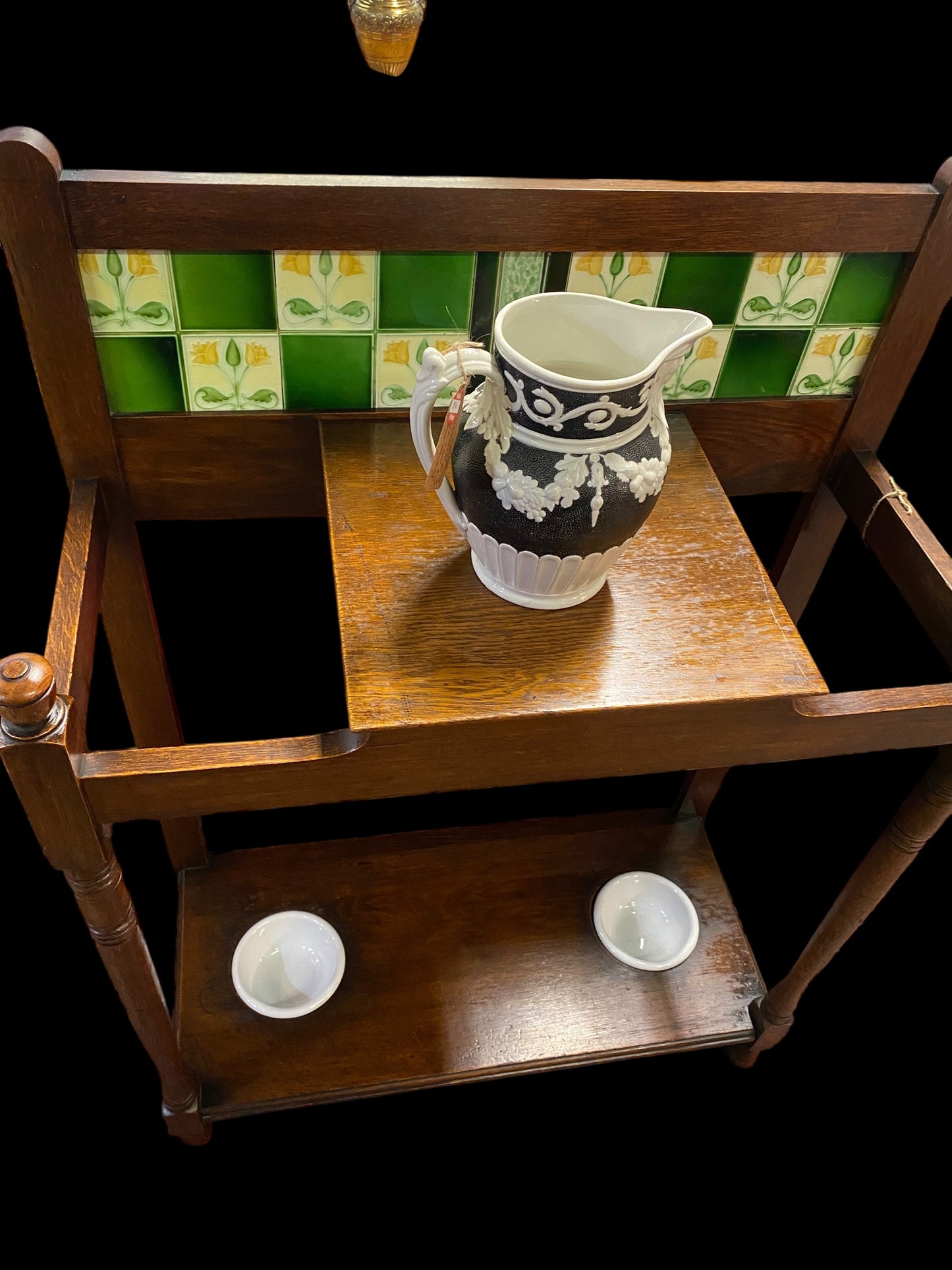 Edwardian tiled backed stick/umbrella stand