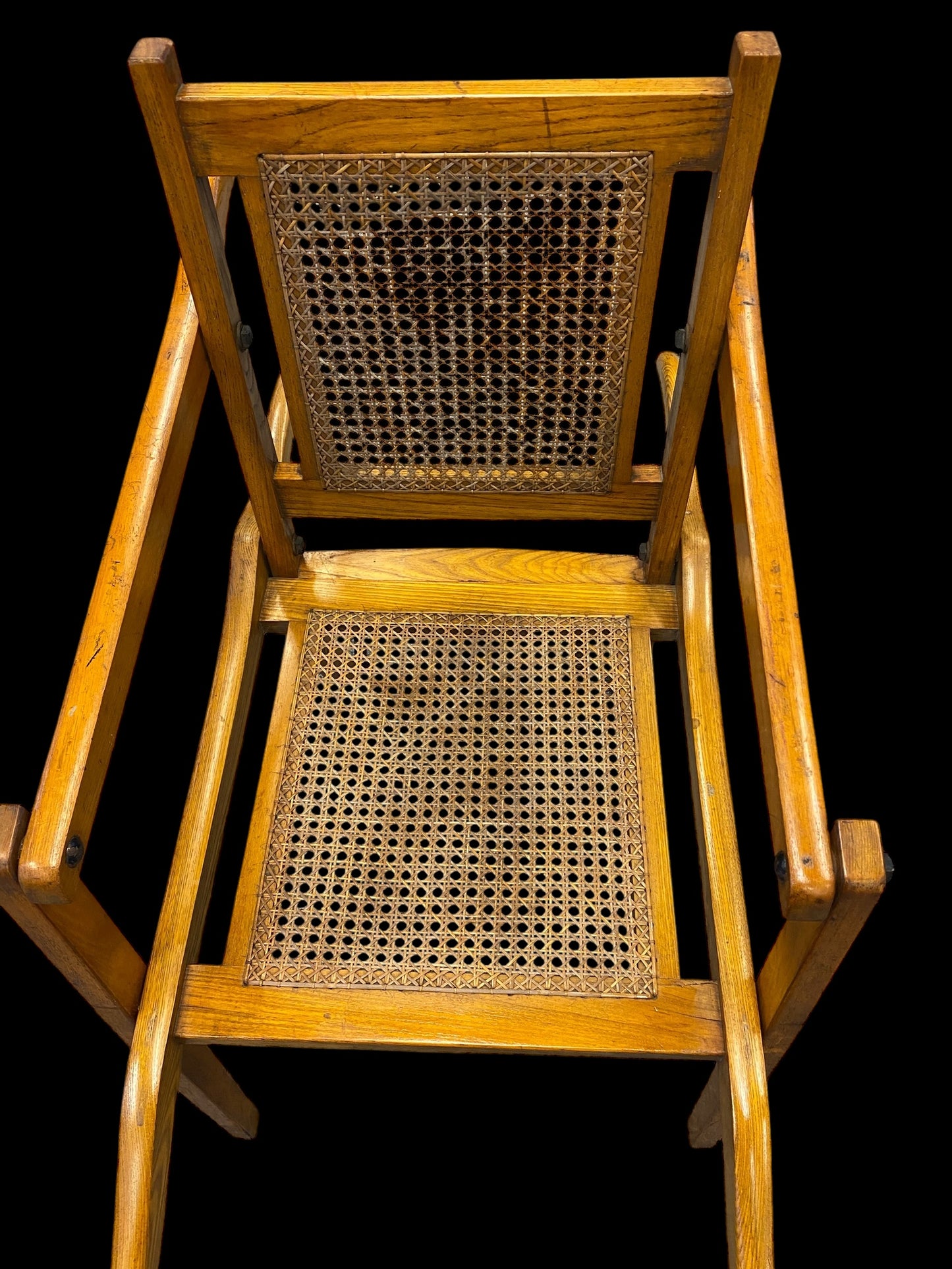 A first World War ash and cane campaign traveling or invalid’s folding armchair