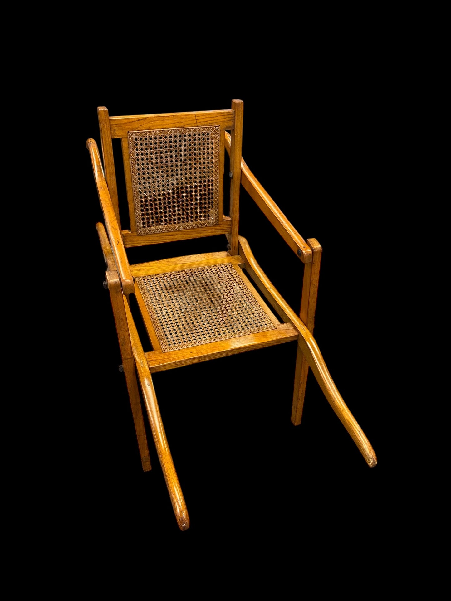 A first World War ash and cane campaign traveling or invalid’s folding armchair
