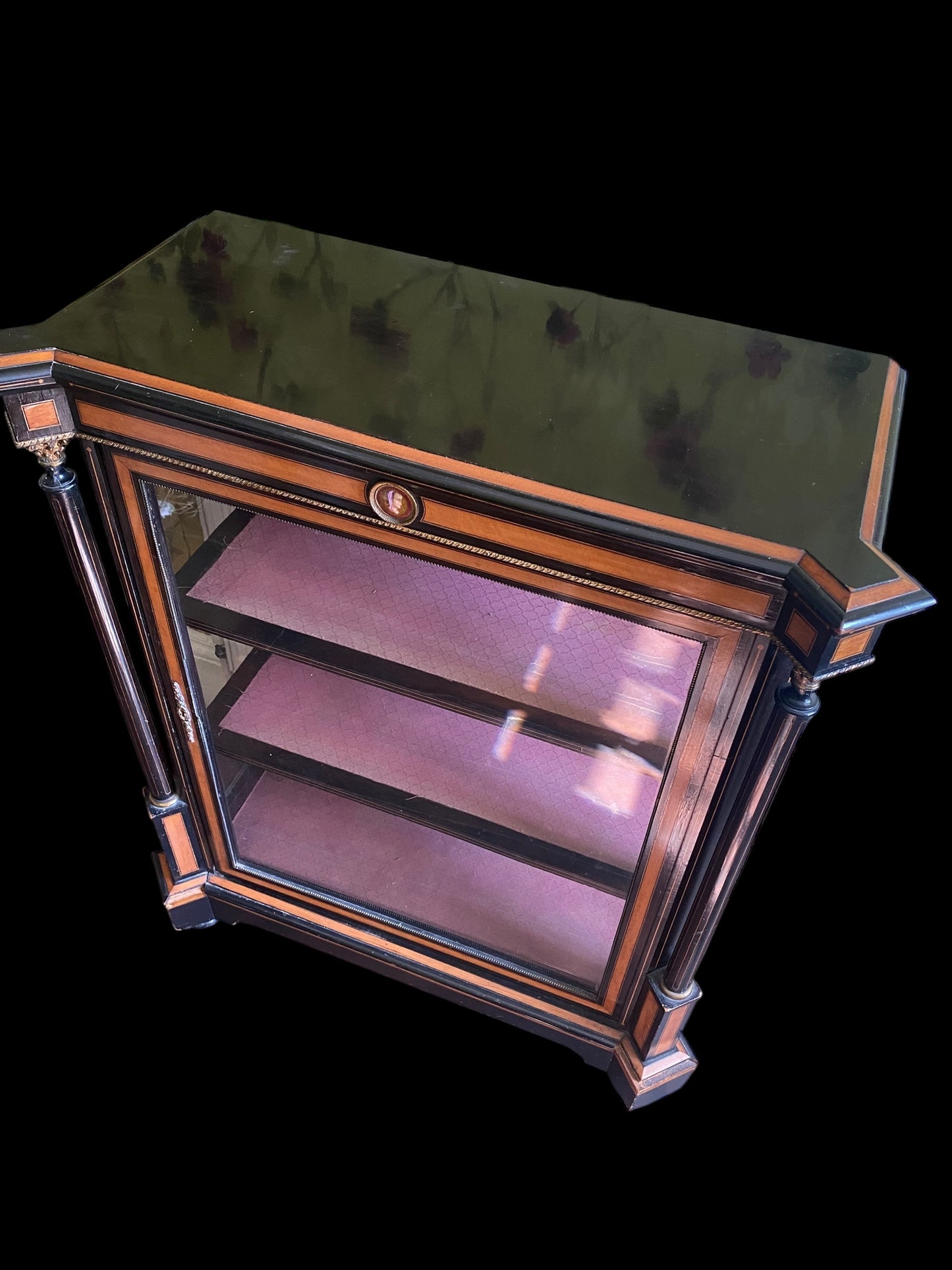 A Victorian ebonised and walnut cross-banded vitrine