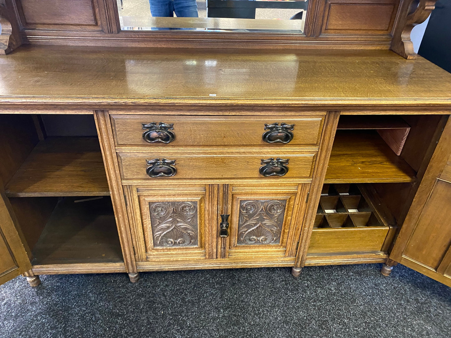 A large 19th century oak and mirror back dresser. Produced by John Taylor & Son of Edinburgh