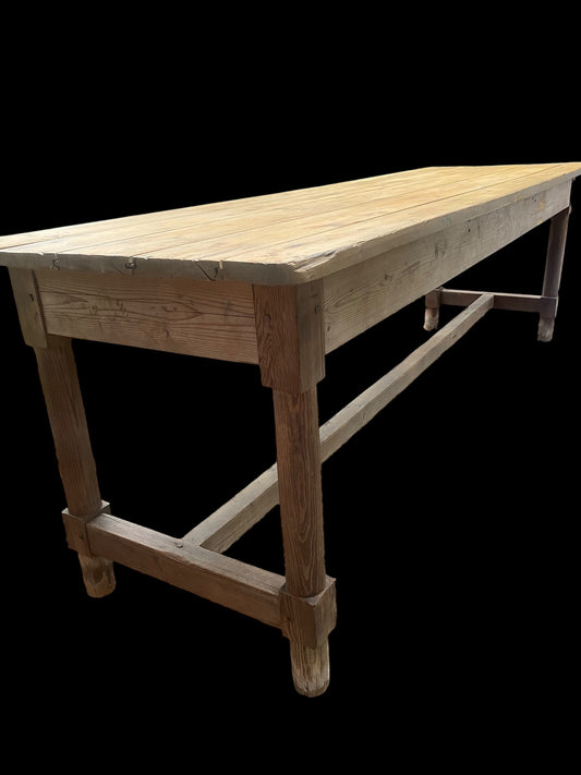 A large 19th century pine farmhouse kitchen table