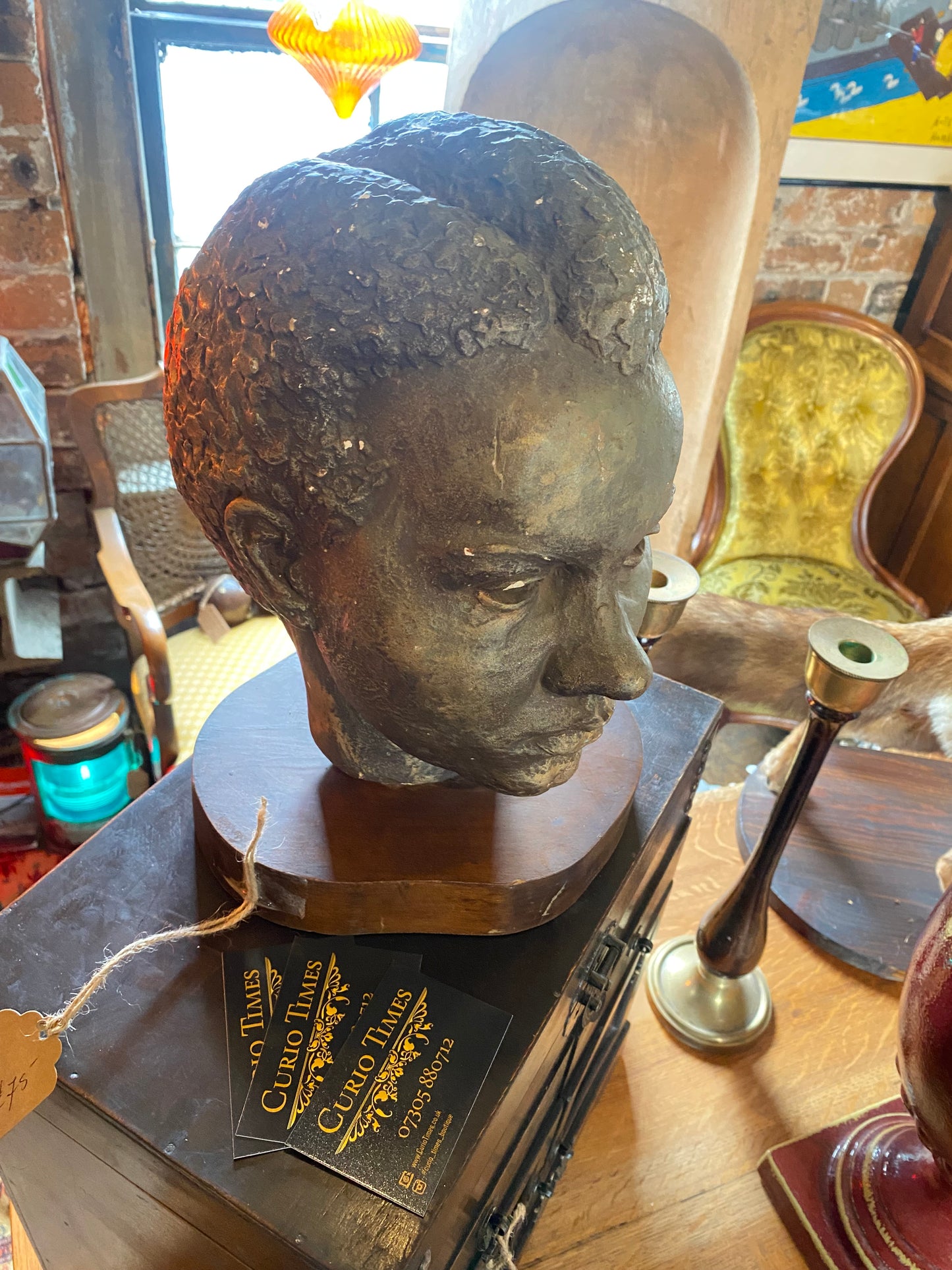 A studio pottery bust of a female
