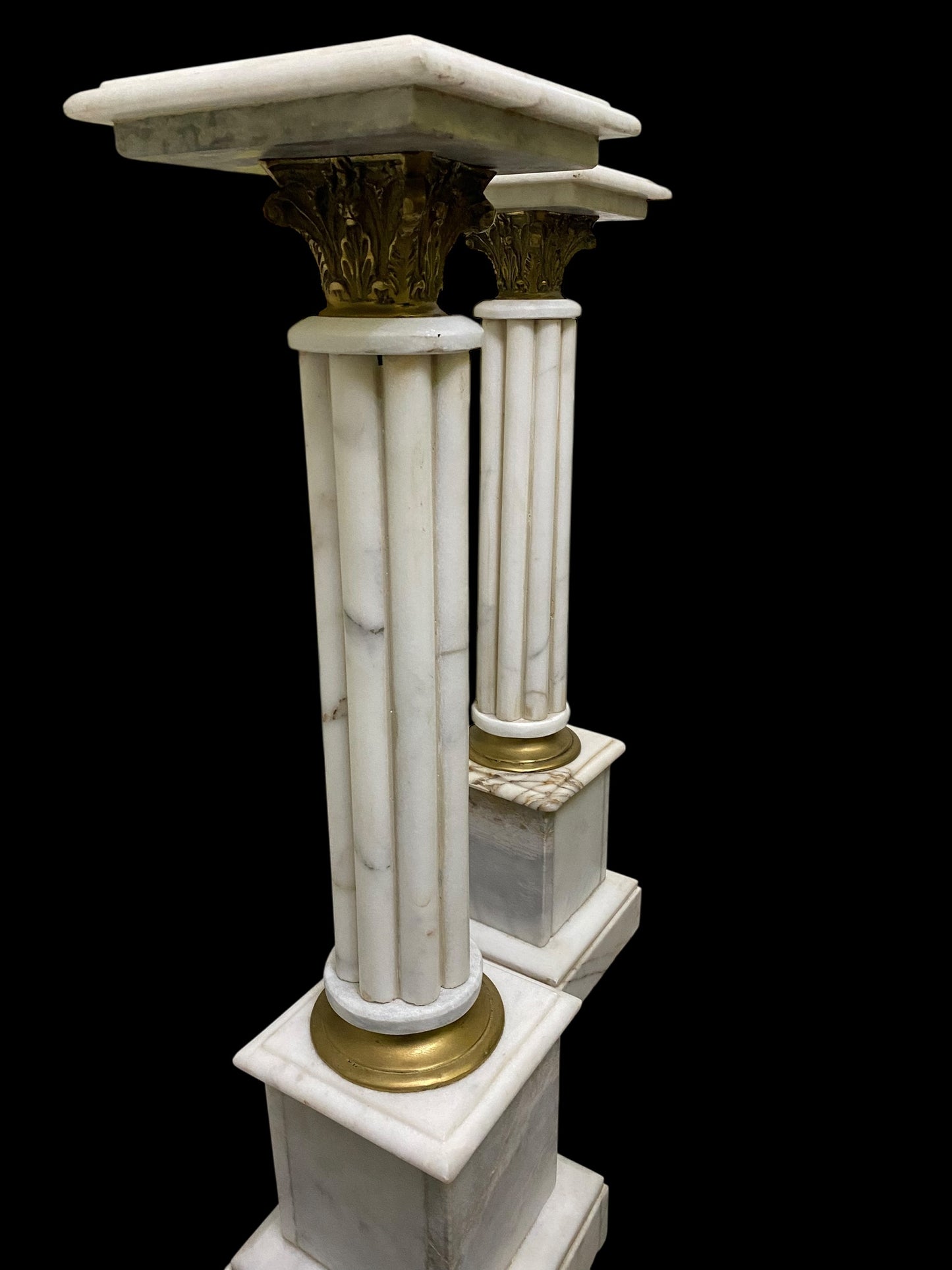 A pair of Carrera marble & gilt brass Torchère