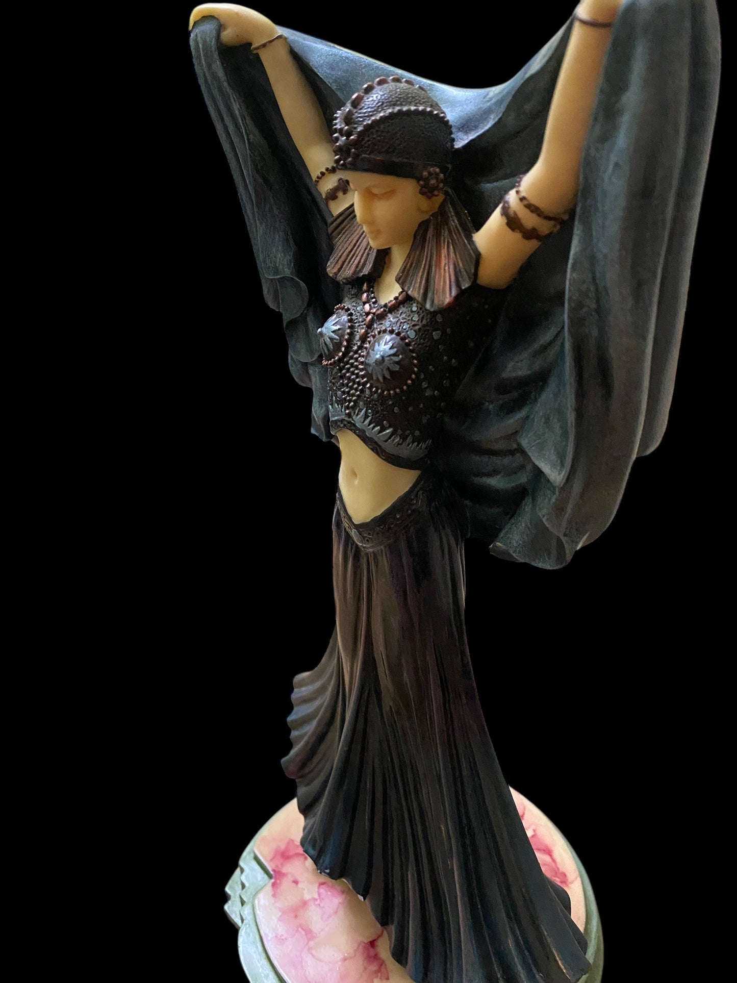 An Art Deco style figure of an exotic dancer in resin