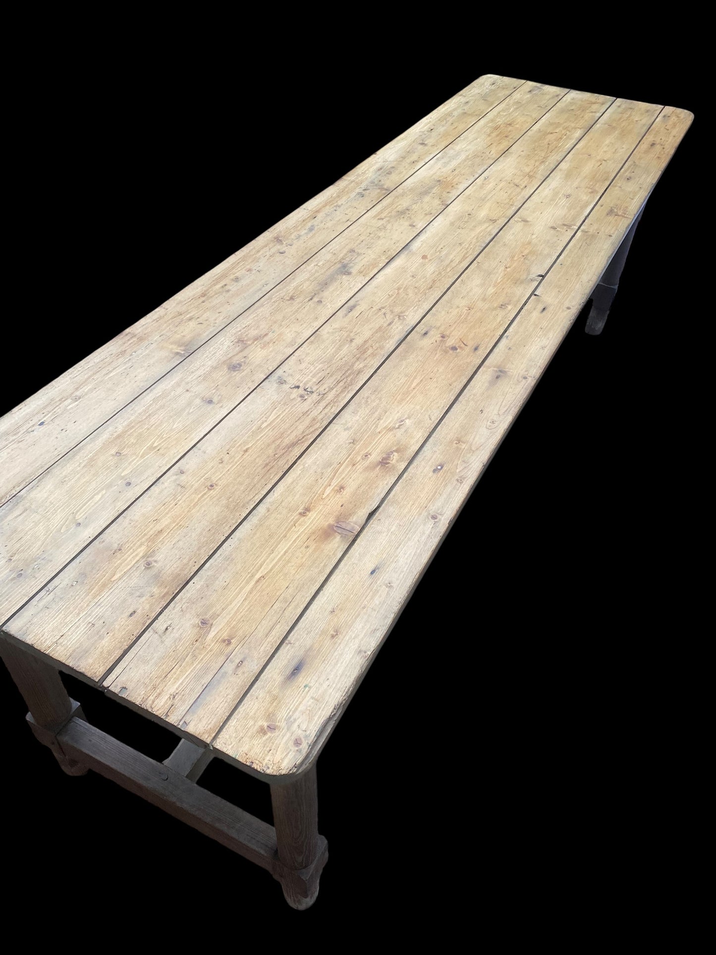 A large 19th century pine farmhouse kitchen table