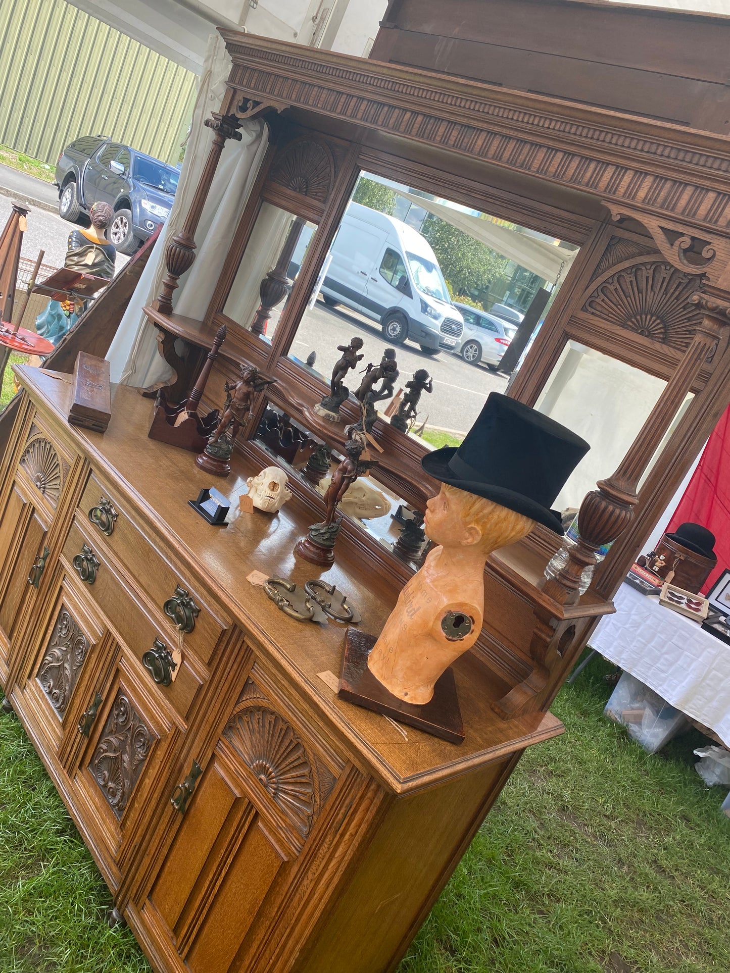 A large 19th century oak and mirror back dresser. Produced by John Taylor & Son of Edinburgh