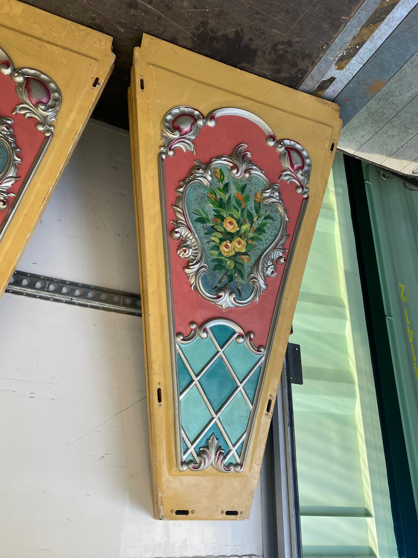 Continental fairground ride panels with hand painted bouquets of flowers