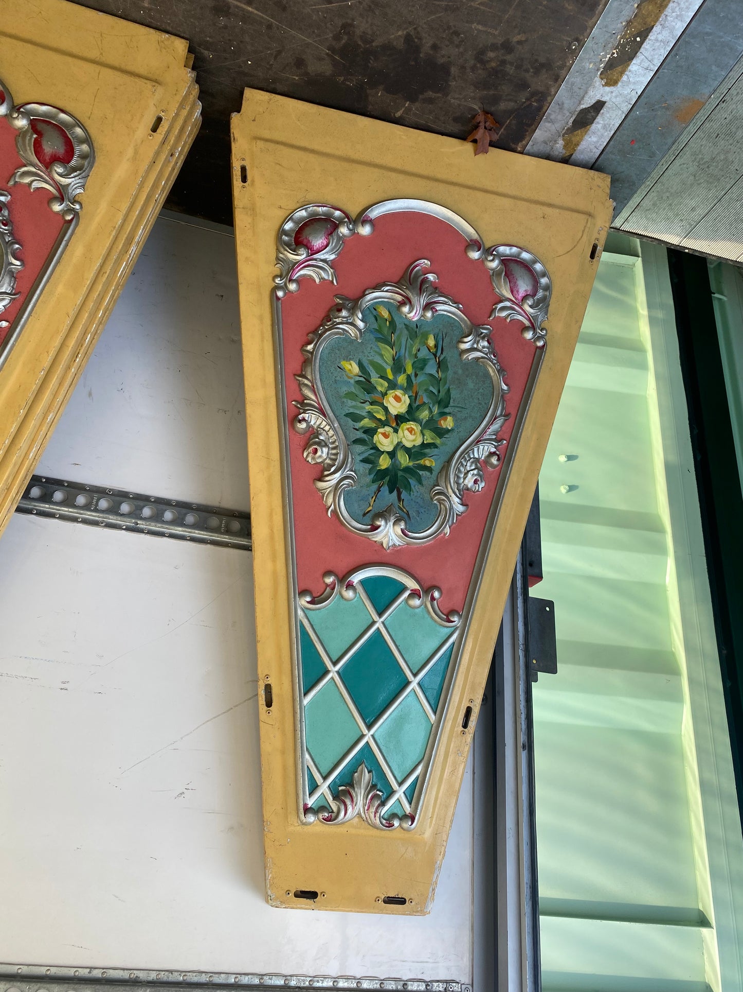 Continental fairground ride panels with hand painted bouquets of flowers