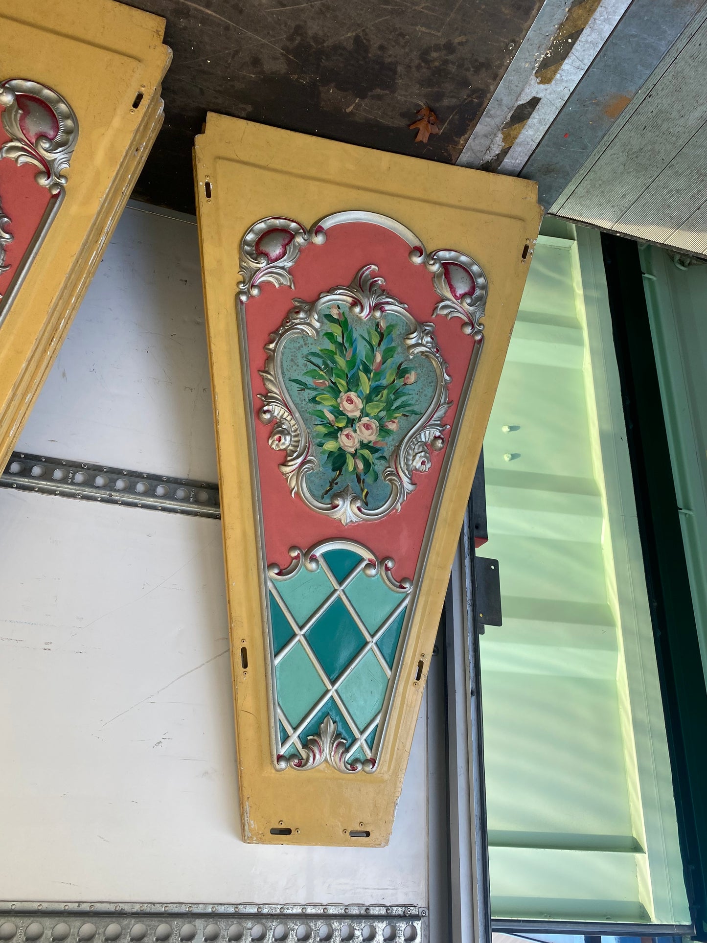 Continental fairground ride panels with hand painted bouquets of flowers