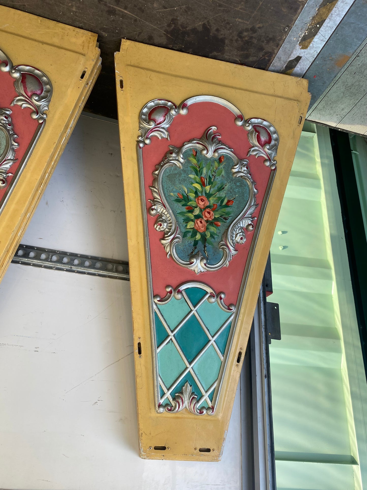 Continental fairground ride panels with hand painted bouquets of flowers