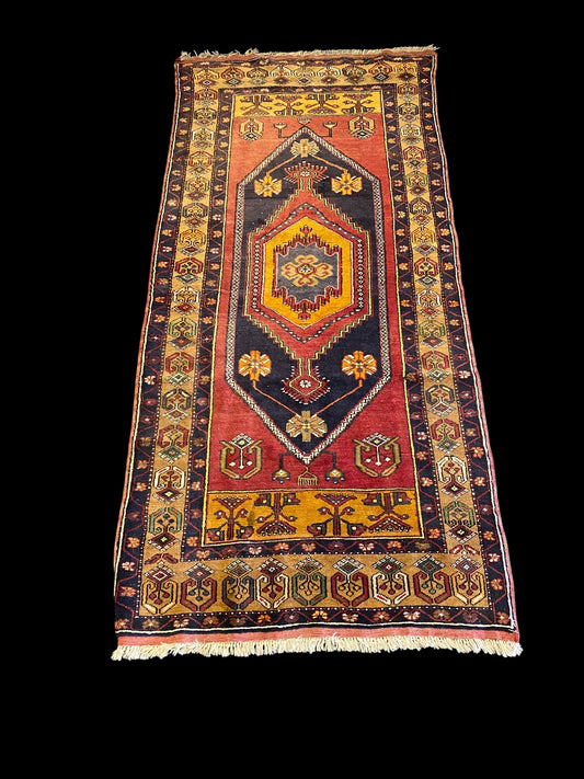Turkish red & blue ground, hand tied woollen rug