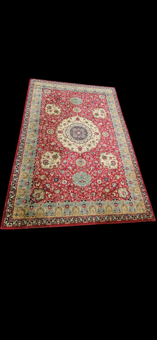 A vintage Middle Eastern style woollen rug by Talak Dessin