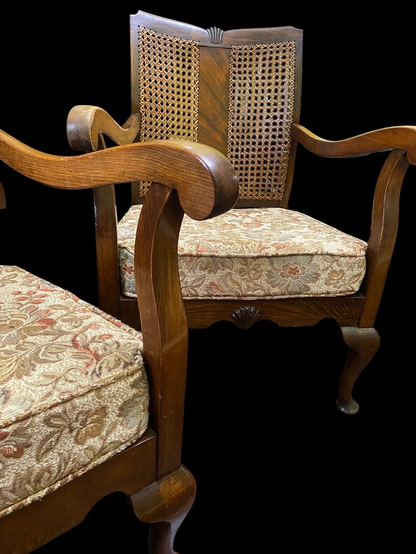 A pair of 1930’s bergère walnut chairs