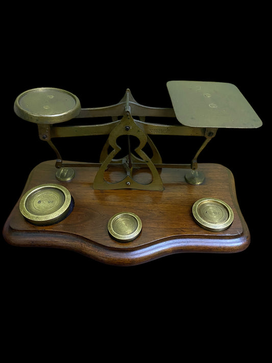 A set of early 20th Century postal scales