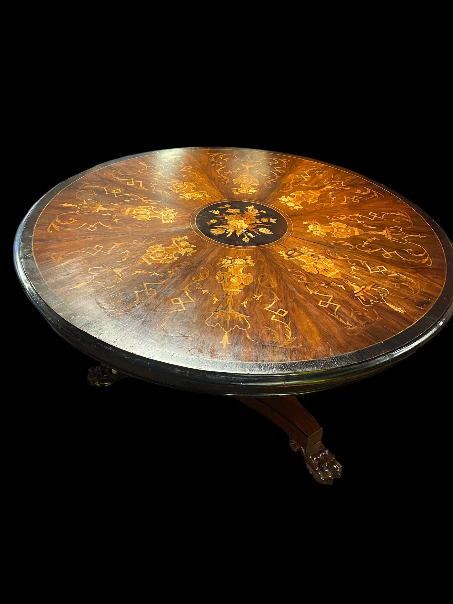A stunning William IV heavily inlaid tilt top dining table