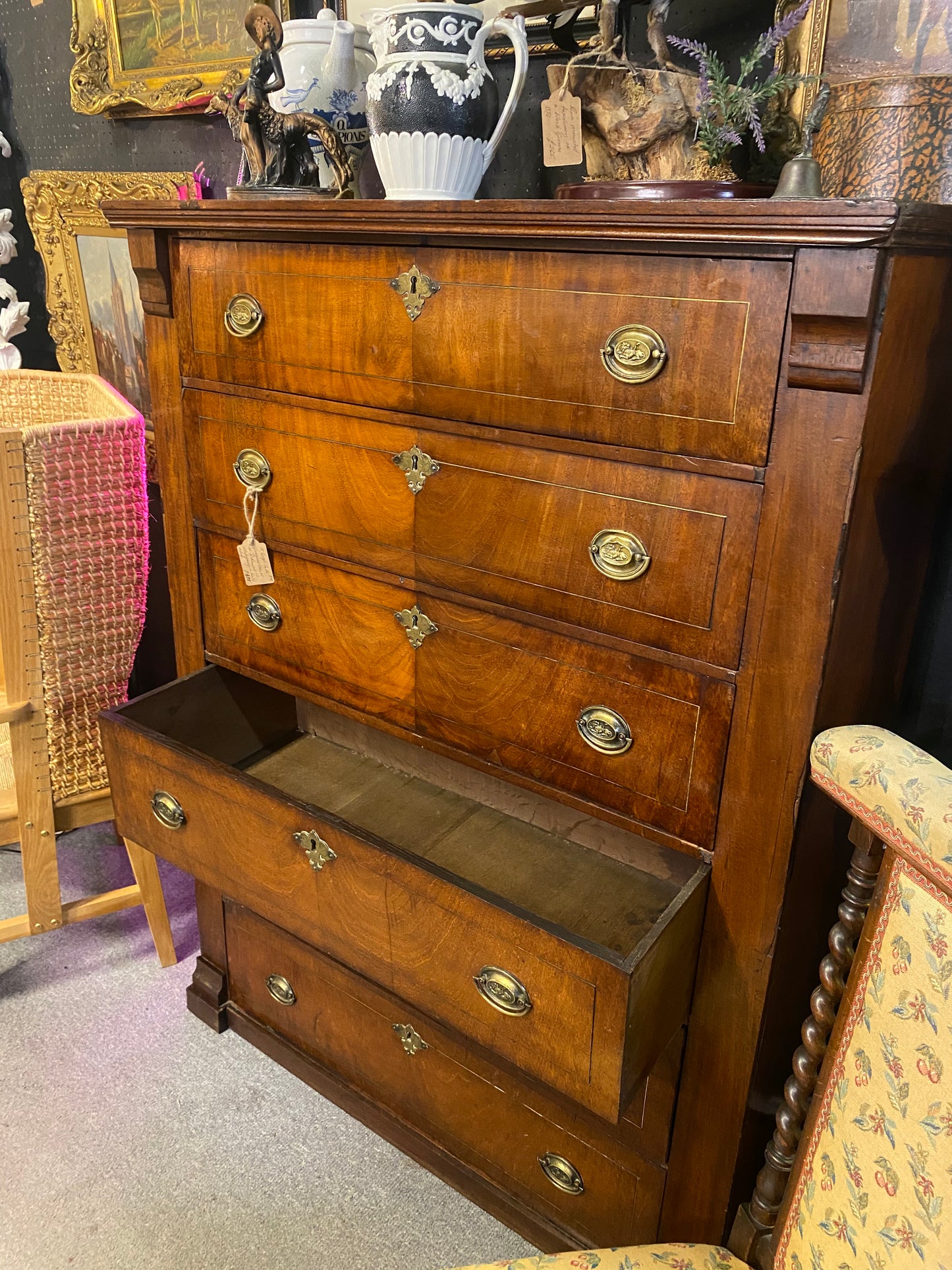 A tall mahogany late Georgian chest of six drawers