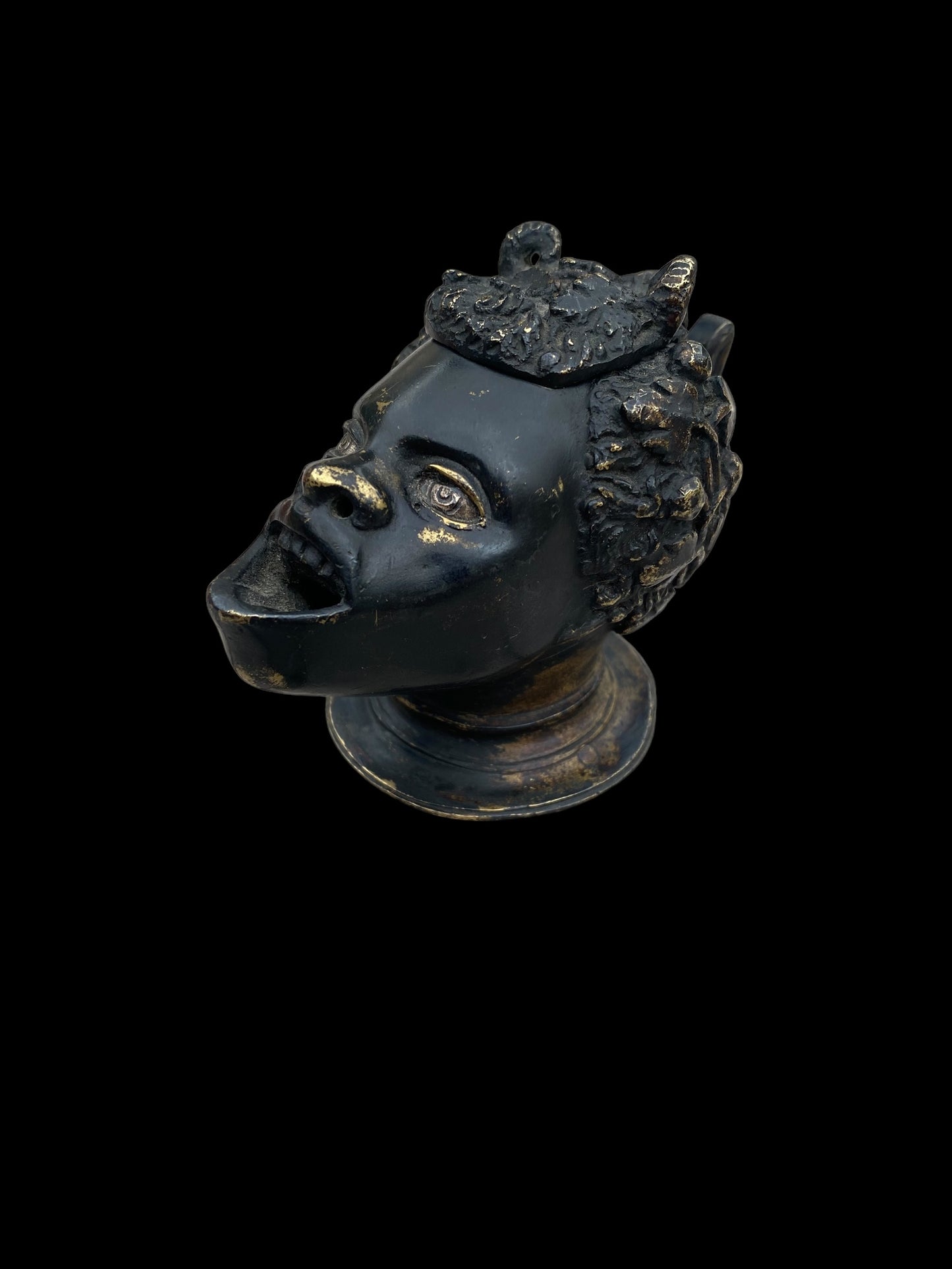 A small bronze oil lamp in the manner of Andrea Riccio (Italian, 1470-1532).