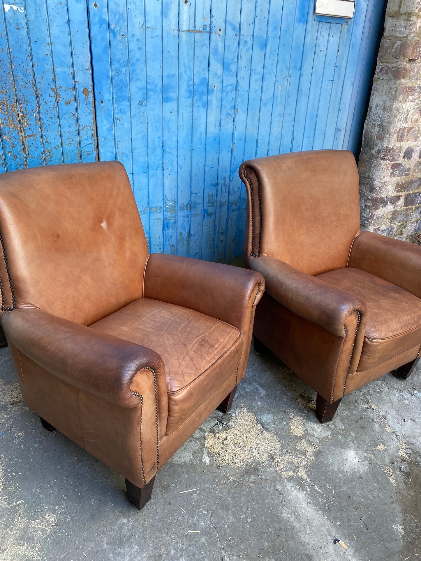Pair of vintage tan leather armchairs (selling individually or as a pair)