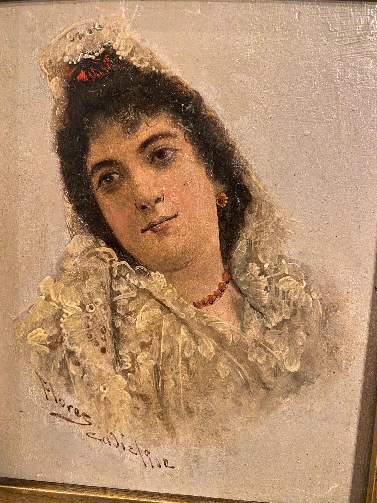 Portrait of a Spanish lady, oil on board, signed by the artist Flores Cadiz