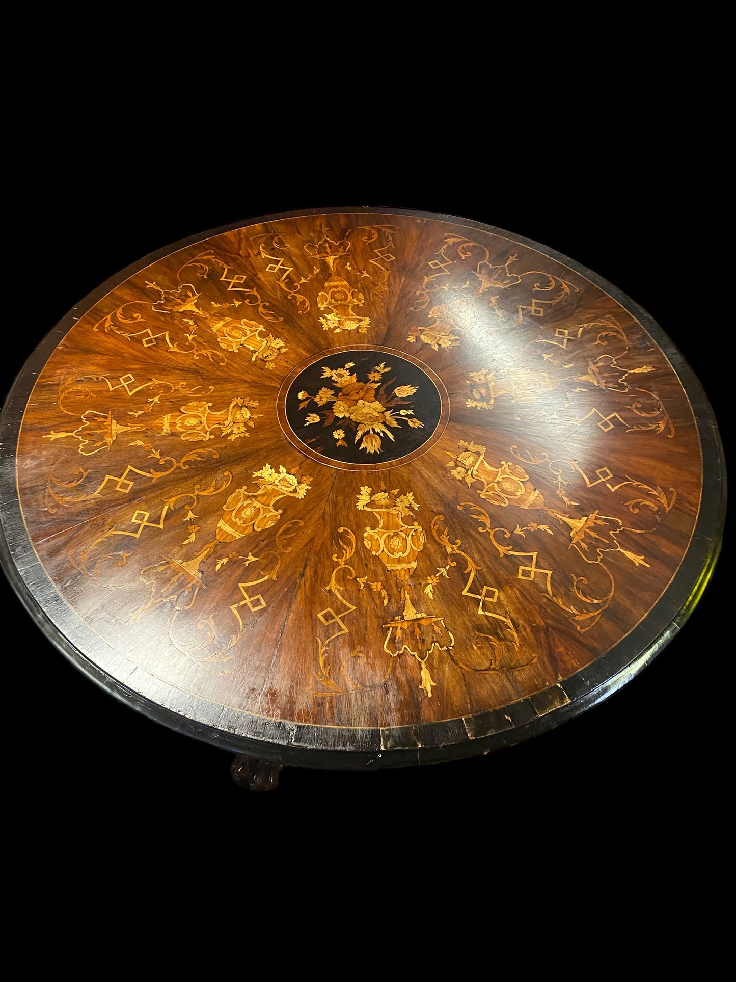 A stunning William IV heavily inlaid tilt top dining table