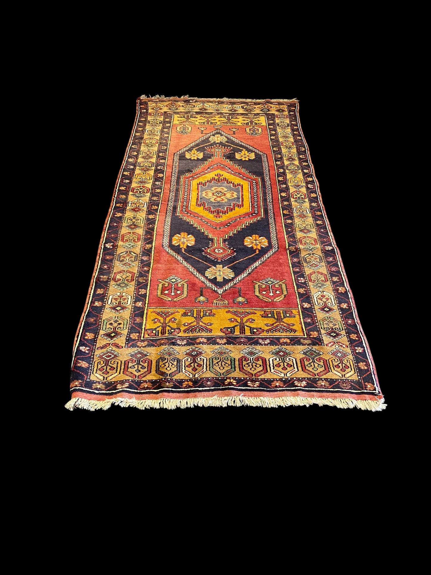 Turkish red & blue ground, hand tied woollen rug