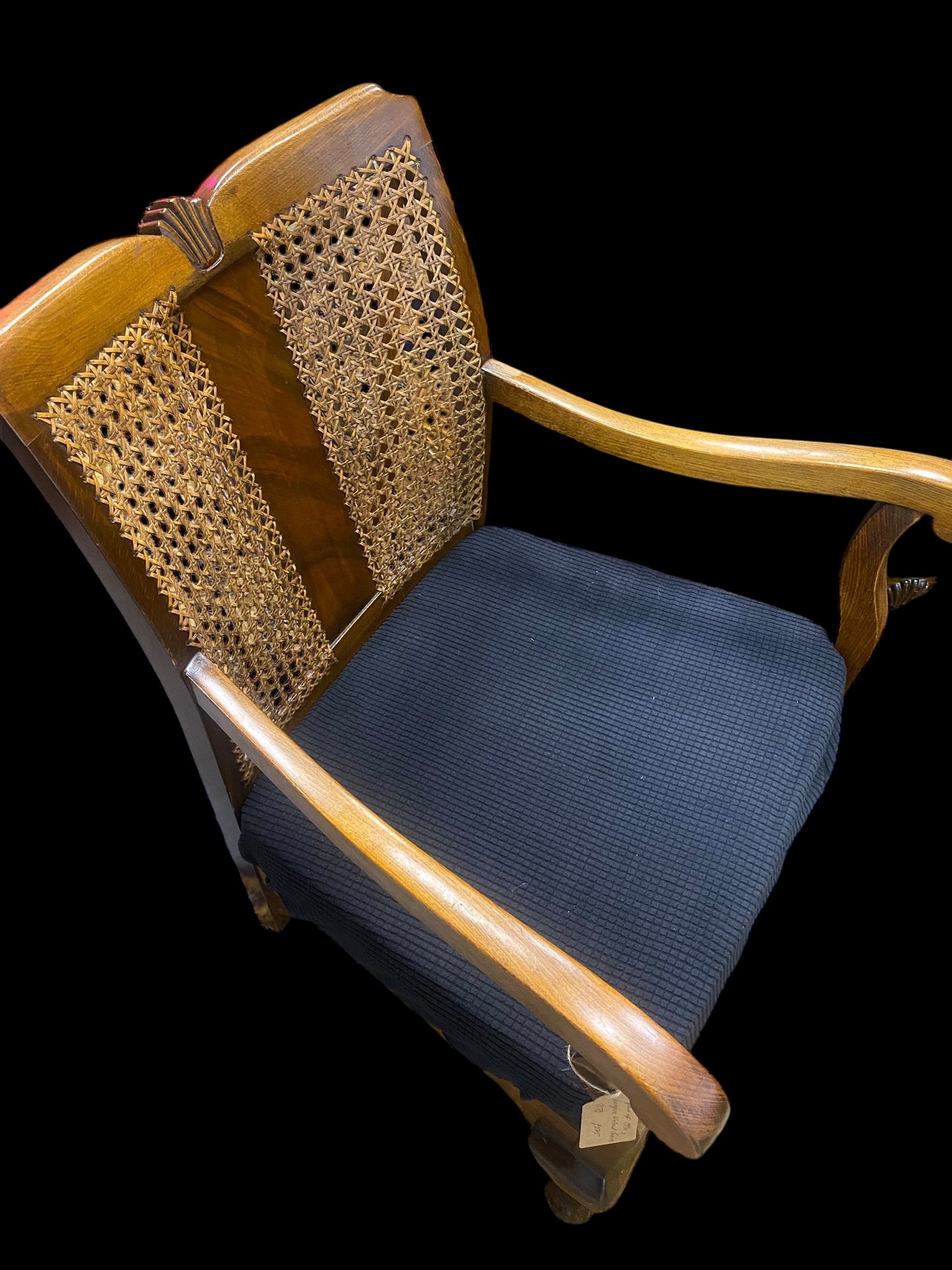 A pair of 1930’s bergère walnut chairs