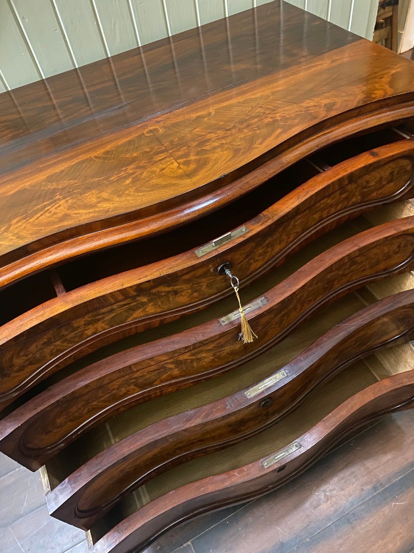 19th Century flame mahogany chest of four drawers