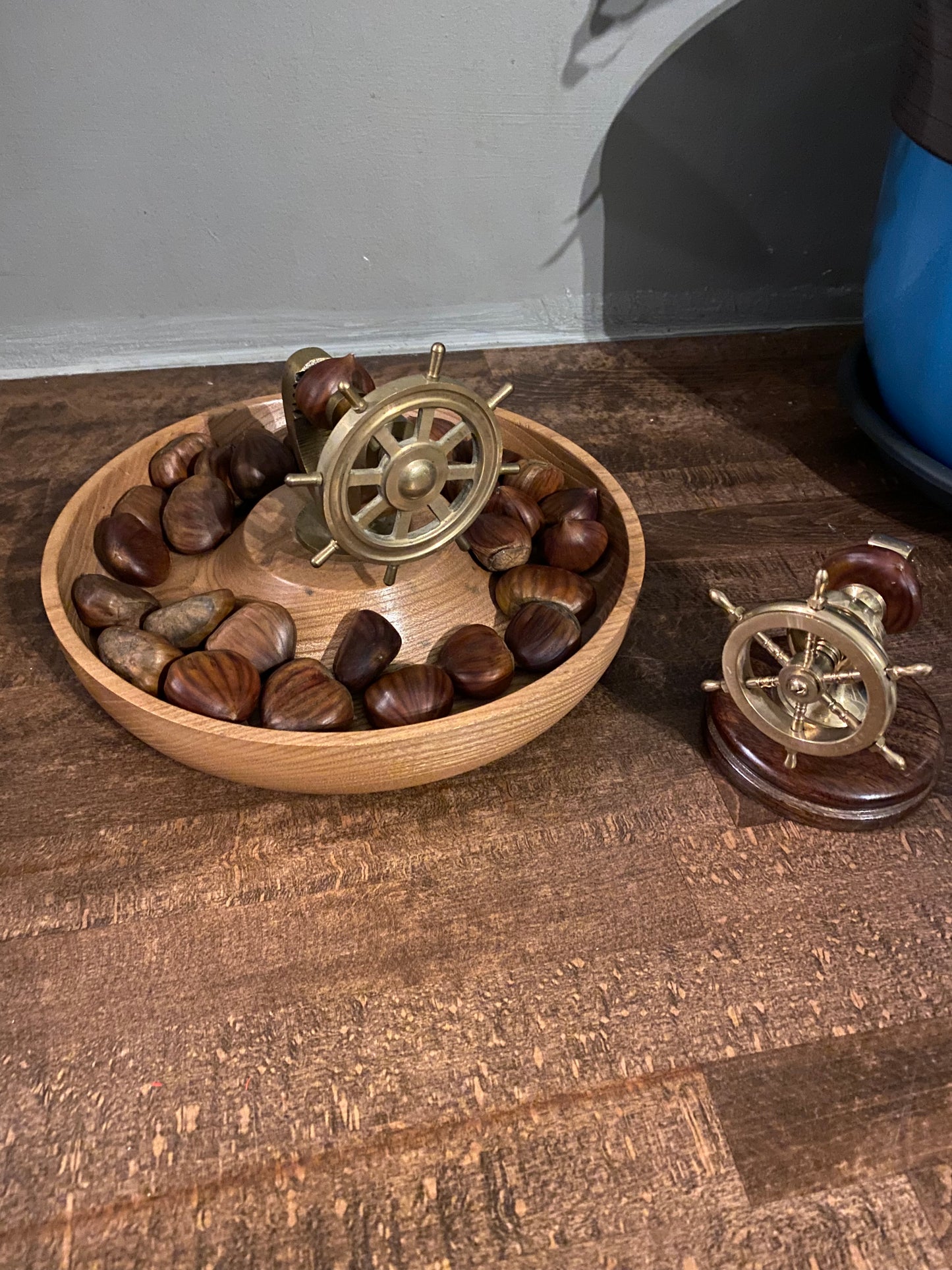 Nautical ship’s wheel nutcracker on small mahogany base