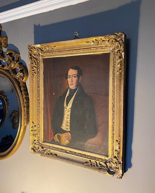 An Early 19th century oil on canvas portrait of a gentleman