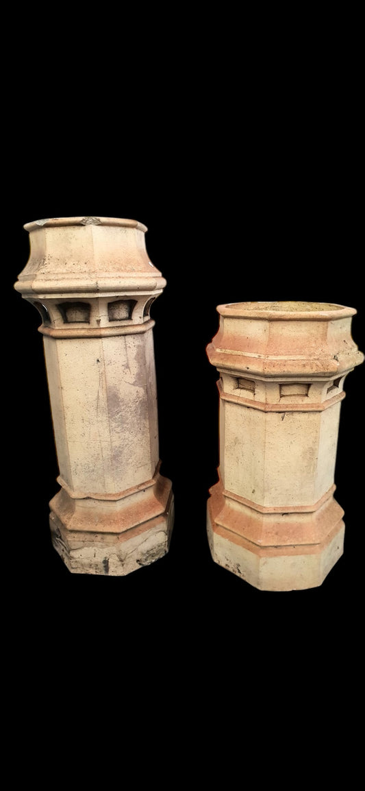 Pair of graduated Victorian stoneware chimney pots