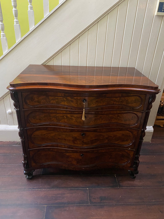 19th Century flame mahogany chest of four drawers