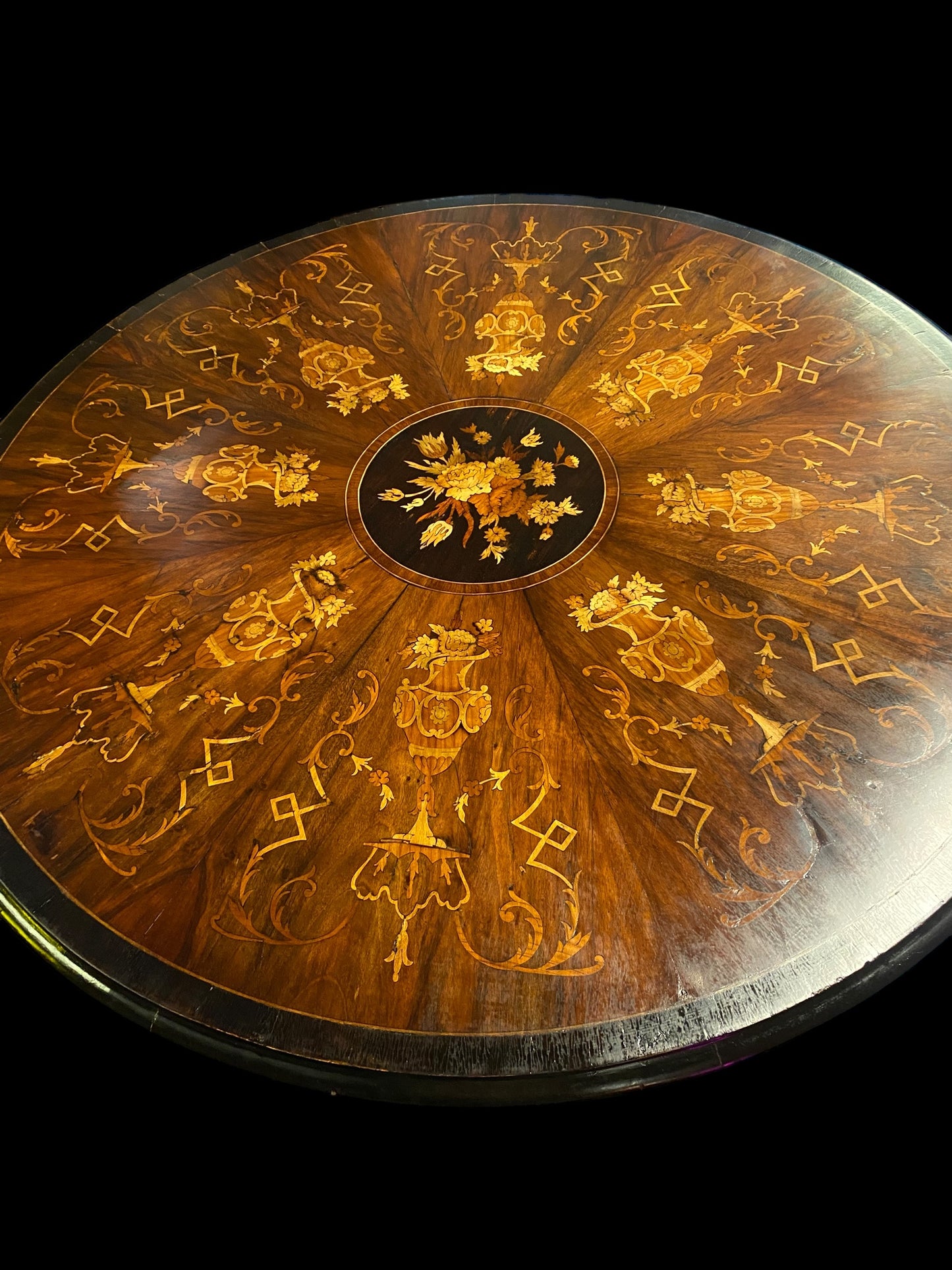 A stunning William IV heavily inlaid tilt top dining table
