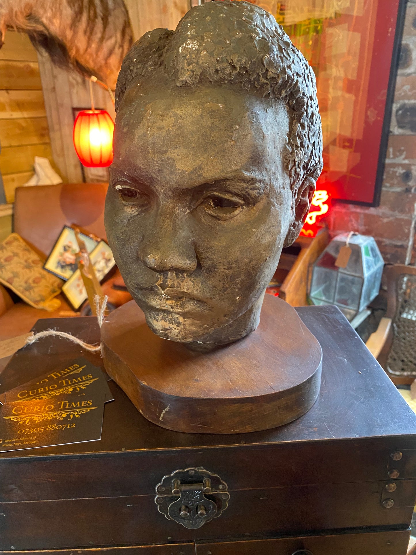 A studio pottery bust of a female