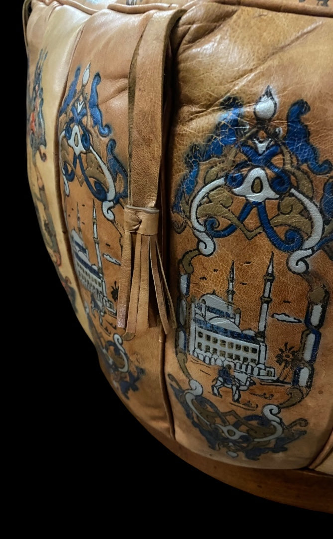 Vintage Egyptian pattern embossed leather pouffe