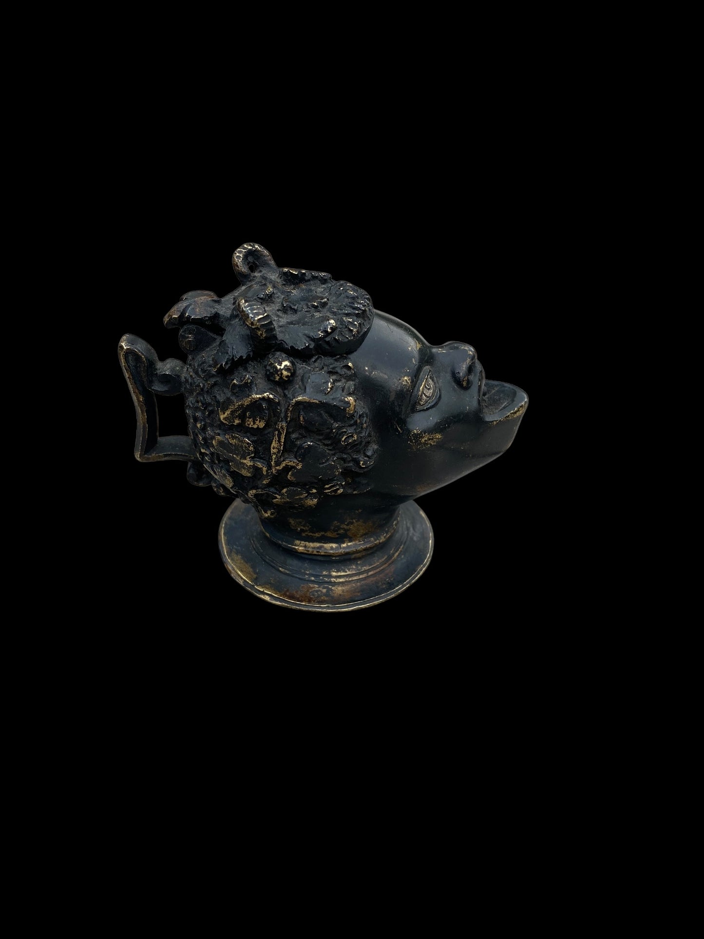 A small bronze oil lamp in the manner of Andrea Riccio (Italian, 1470-1532).