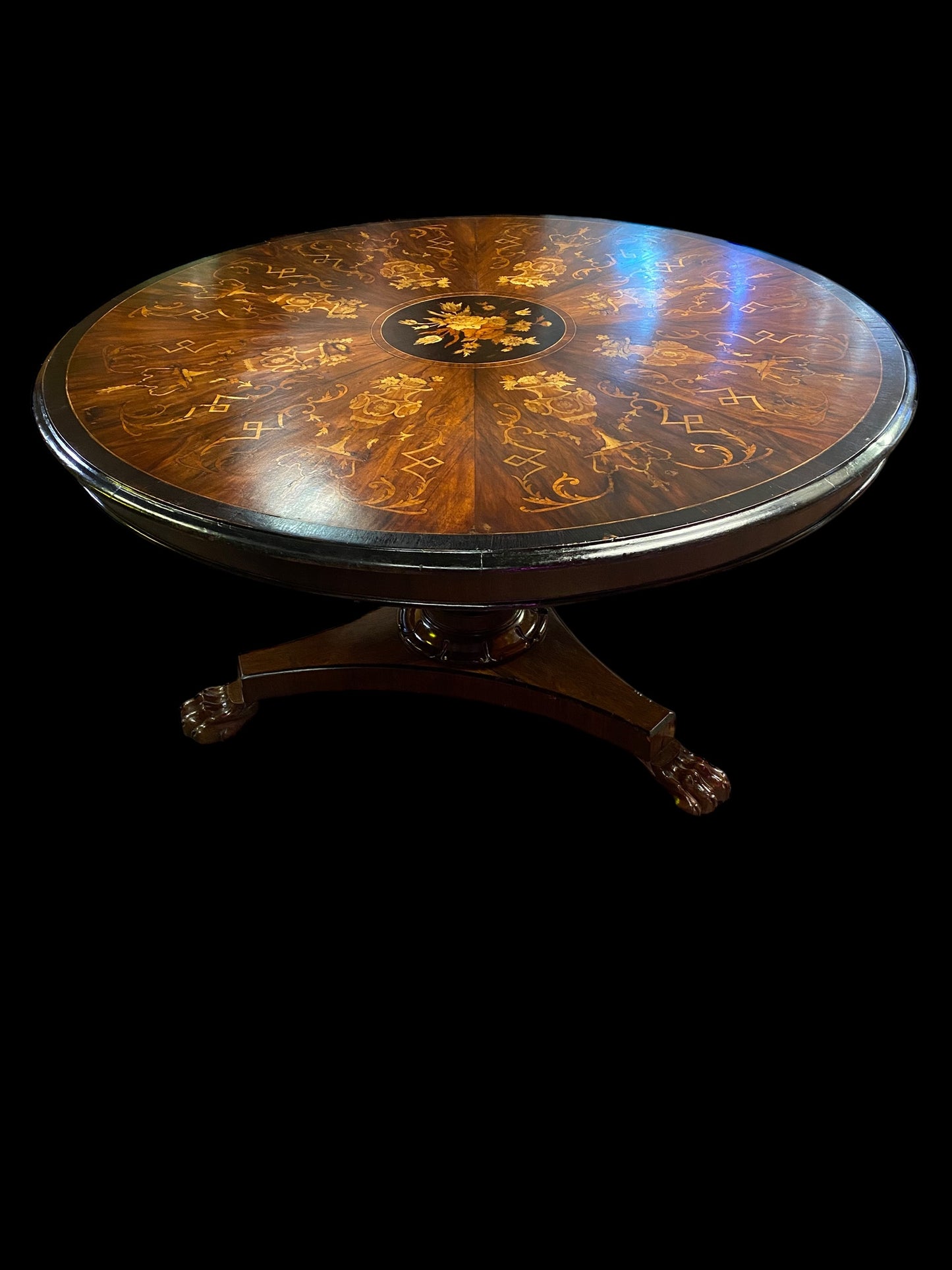 A stunning William IV heavily inlaid tilt top dining table