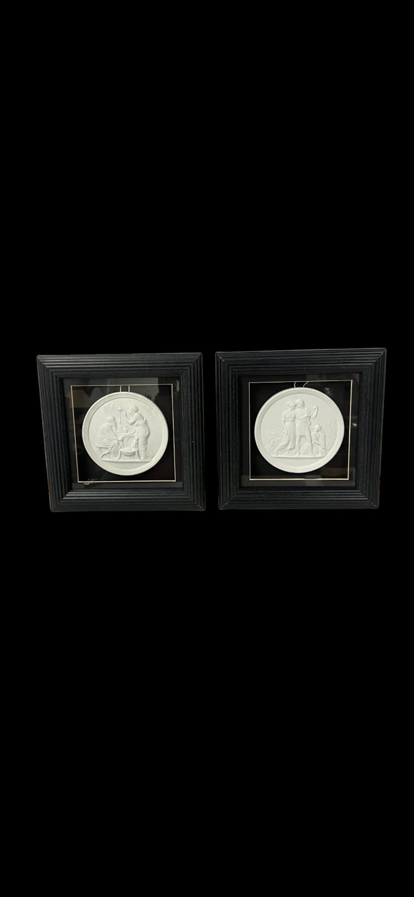 A framed pair of royal Copenhagen bisque porcelain plaques