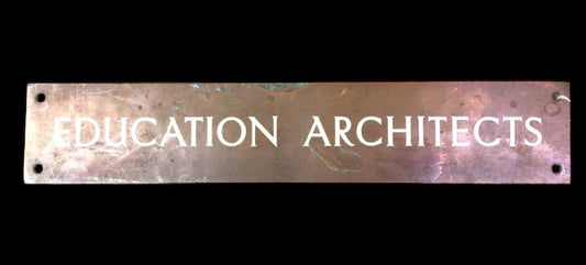 Copper door sign ‘Education Architects’